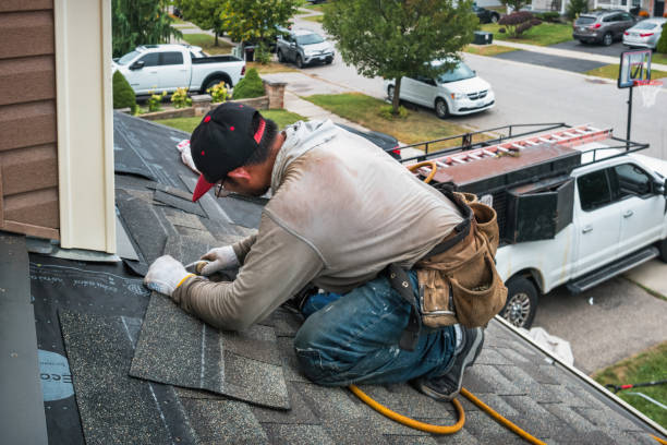 Professional Roofing technician working in Troy, IL